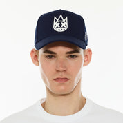 Cult's Logo Mesh Back Trucker Hat "Shimuchan" in Midnight Blue
